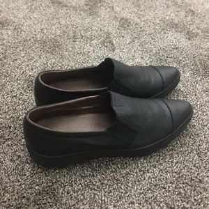 Slip ons by 8. I wear a size 11 womens or 9.5 mens and these were a tad small